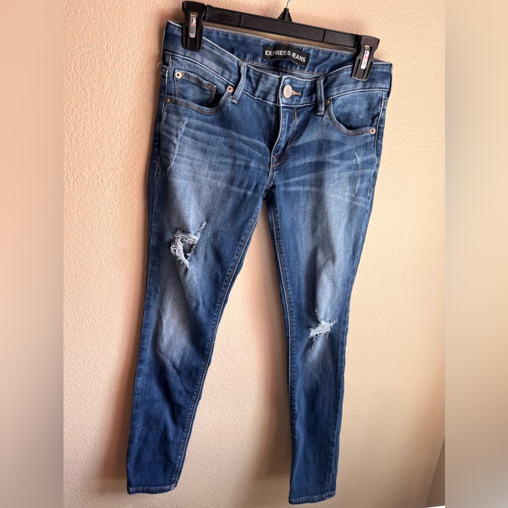 Women’s ripped boot cut jeans
